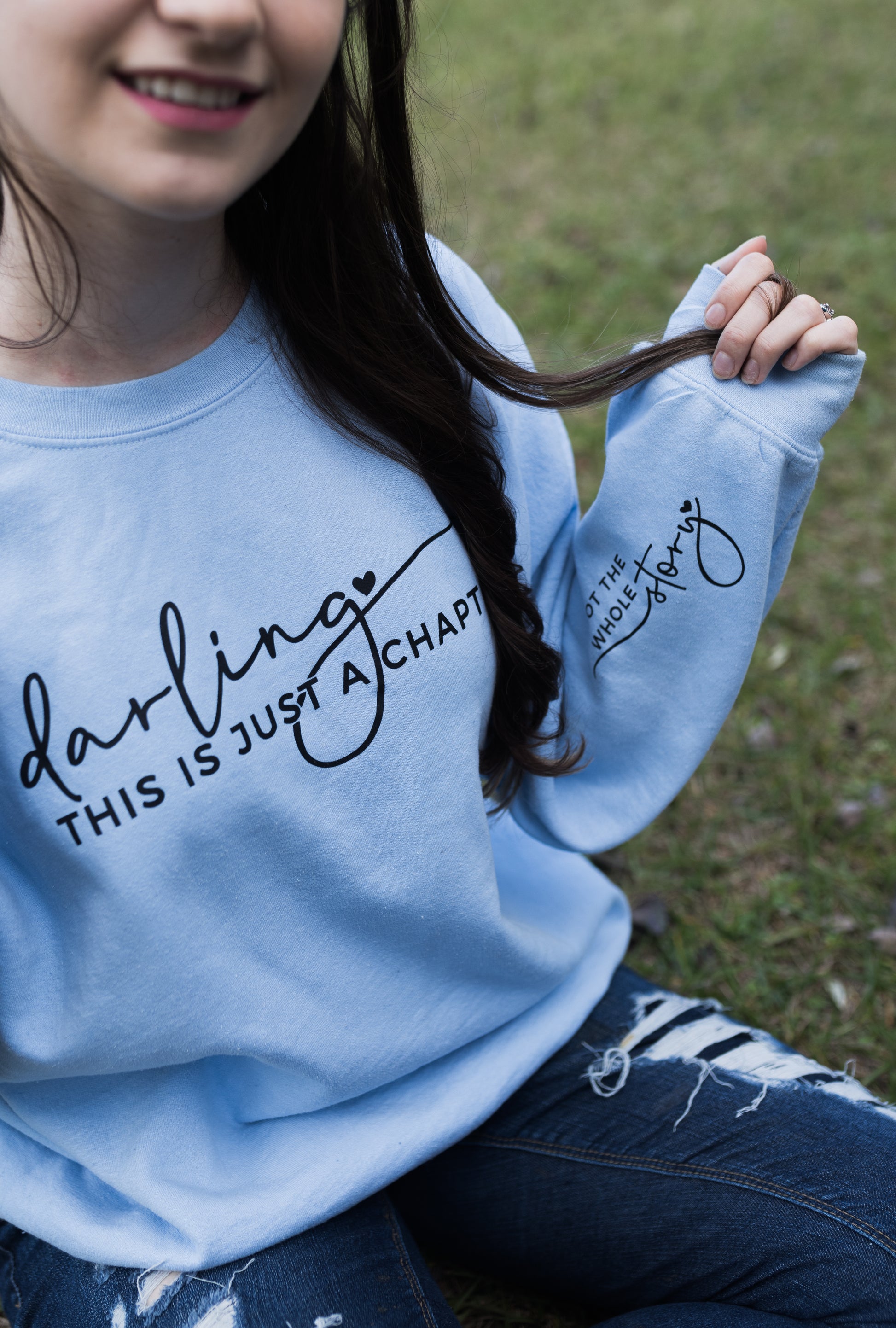 crewneck sweater with this is just a chapter on it apparel small shop